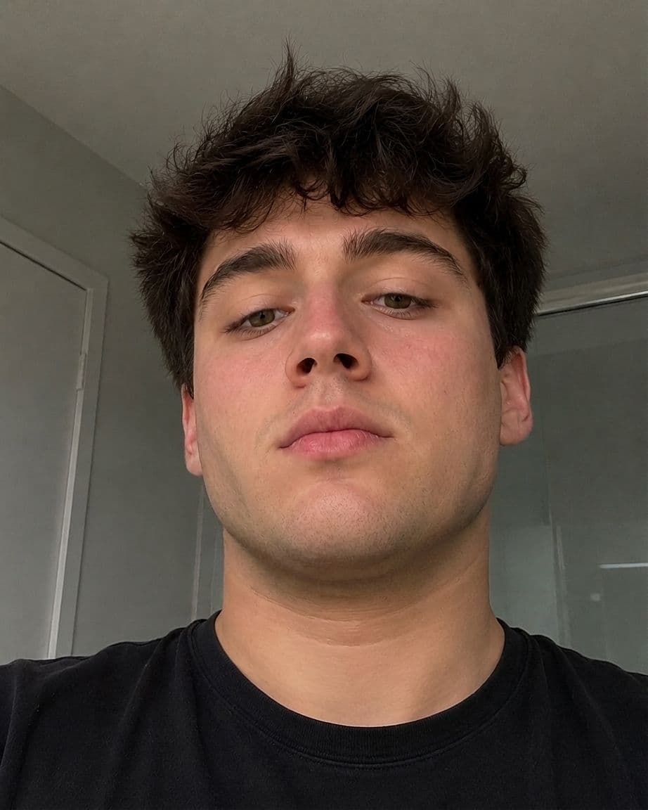 After jawline filter: man's selfie with a sharper, more defined jawline