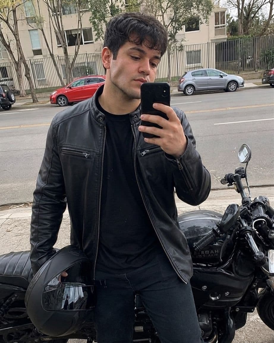 After jawline filter: man's motorcycle selfie with a sharp, defined jawline