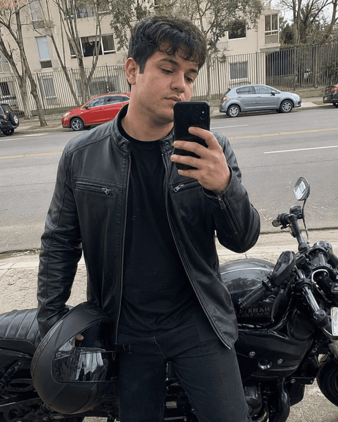 Before jawline filter: man's motorcycle selfie with a soft, invisible jawline