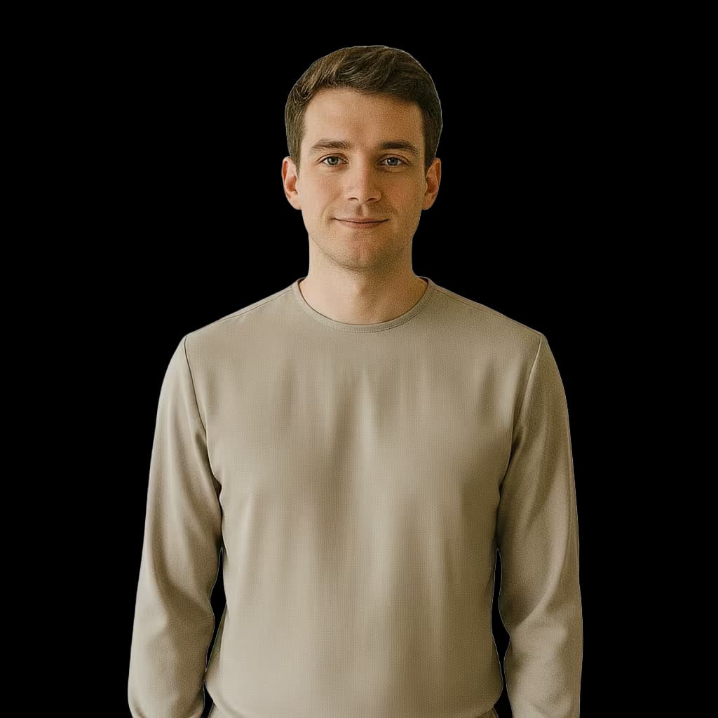 Professional healthcare headshot of a male home health and personal care aide in clinic casual blouse on hospital exterior and no accessories